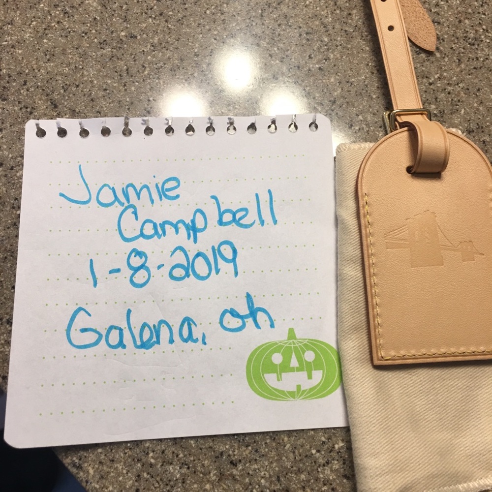 New luggage tag authentic